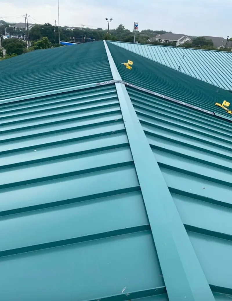 Green commercial metal roof ridge and valley for Metal Roof Repair in Prosper