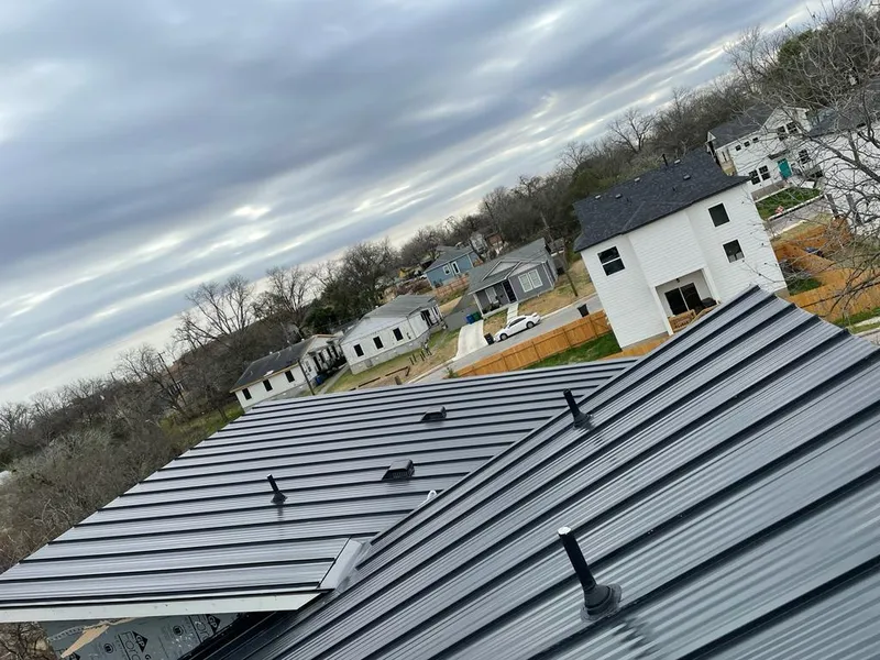 Standing seam metal roof panels with vents for Skylight Repair in Prosper